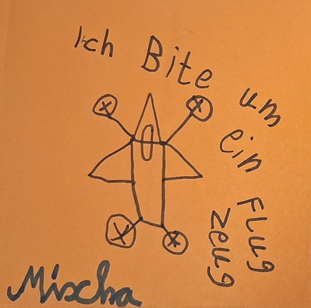 Weihnachtsgeschenke-Übergabe mit Verimi unterm Weihnachtsbaum